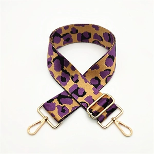Adjustable purple leopard print crossbody bag strap with gold metal lobster hooks