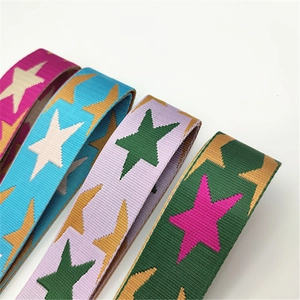 Detail of colorful woven star pattern straps in rose, blue, purple, and green shades