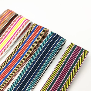 Detailed view of colorful ethnic pattern woven shoulder straps for crossbody bags