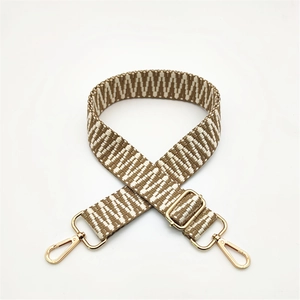 Adjustable brown and white geometric woven replacement shoulder strap with gold metal buckles