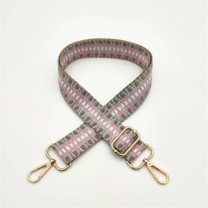 Adjustable woven replacement shoulder strap with pink geometric patterns and gold clips
