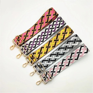Adjustable woven canvas wide bag straps with colorful geometric patterns and gold clips