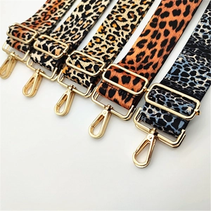 Variety of leopard print bag straps with golden swivel hooks and adjustable metal buckles