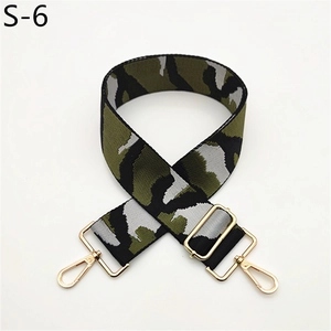 Detail of adjustable wide camo shoulder strap with premium golden metal swivel lobster clasps