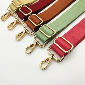 Detail view of five adjustable colorful shoulder straps with polished golden zinc alloy clips