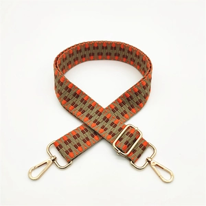 Bandoulière bohème tissée réglable avec motif orange et attaches en métal doré