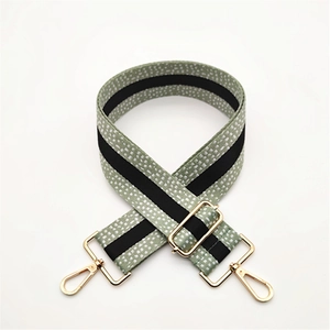 Adjustable wide woven shoulder strap in green and white check pattern with gold hooks