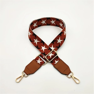 Adjustable wide replacement bag strap with colorful star pattern and gold hardware