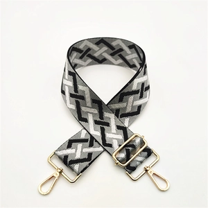 Adjustable wide woven shoulder strap for bags with black and white geometric pattern