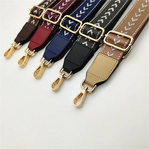 Adjustable woven shoulder straps in five colors with white V-pattern and gold buckles