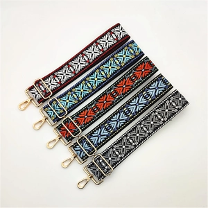 Adjustable woven wide shoulder straps with colorful geometric patterns and gold clips