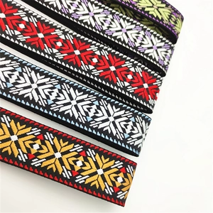 Detailed snowflake jacquard woven patterns in red, purple, blue, and gold strap options
