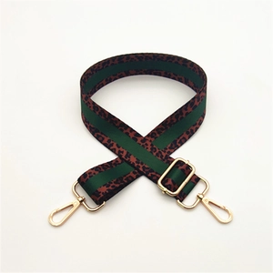 Adjustable leopard print canvas bag strap with green stripe and gold metal lobster clasps