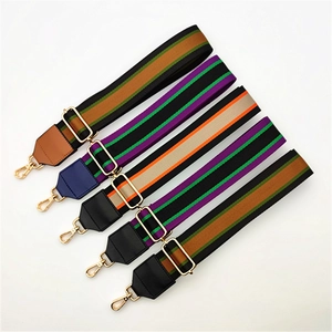 Adjustable wide striped canvas shoulder strap for handbags with gold swivel hooks and leather