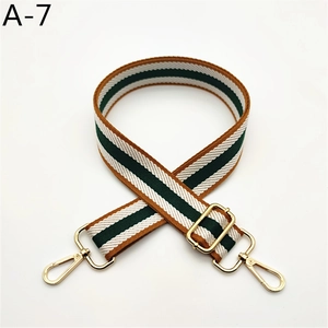 Adjustable brown, green, and white striped strap with gold lobster clasps and buckles