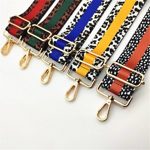 Close-up of adjustable leopard print bag straps with durable gold lobster clasps
