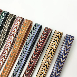 Detail of 2.5cm wide bohemian woven bag straps with geometric V-pattern textures