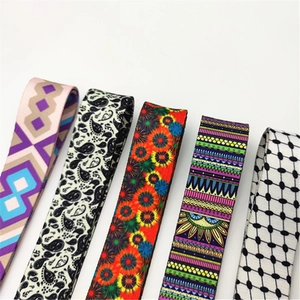 Detail showing five colorful patterned fabric shoulder straps with diverse floral prints