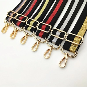 Detail of adjustable woven straps with gold-finished buckles in multiple colors