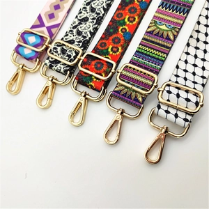 Adjustable woven shoulder straps for handbags with colorful patterns and gold metal hooks