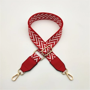 Adjustable red and white herringbone woven PU leather shoulder strap with gold hardware