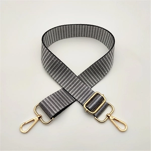 Adjustable grey and black striped fabric shoulder strap with gold swivel hooks for handbags