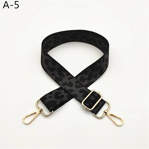 Adjustable leopard print bag strap with black and grey pattern and gold metal lobster clasps