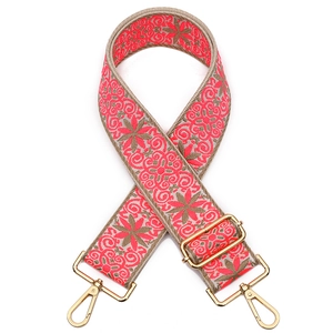Adjustable beige bag strap with vintage pink floral embroidery and gold metal hooks