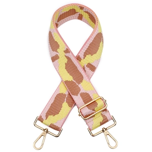 Adjustable wide woven bag strap with pink geometric patterns and gold metal clips