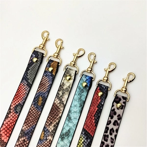 Close-up of PU leather replacement shoulder straps with snake and leopard patterns