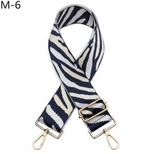 Adjustable zebra stripe canvas bag strap with durable gold metal lobster clasps