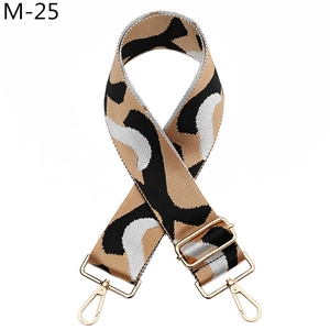 Close-up of leopard print wide replacement bag strap with golden metal hook buckle