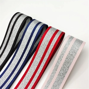 Close-up of 5cm wide striped bag straps with silver glitter weave in four colors