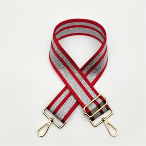 Adjustable 5cm wide shoulder strap with red and silver metallic weave and gold clips