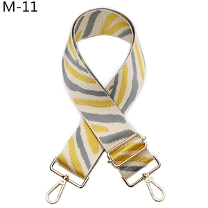Adjustable woven replacement strap with yellow zebra patterns and golden metal hardware