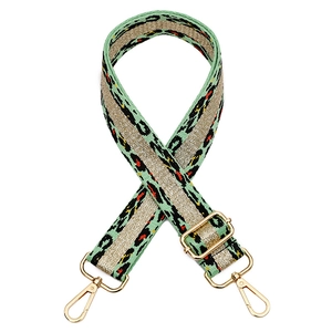 Adjustable leopard print bag strap in green and gold with premium metal hooks