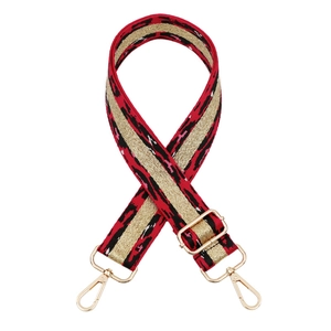 Adjustable leopard print bag strap with red, black, and pink weave and gold metal hooks