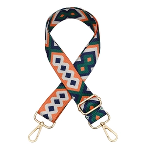 Ethnic wide woven bag strap with colorful diamond pattern and golden metal clips