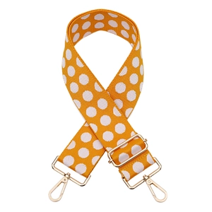Adjustable yellow polka dot jacquard shoulder strap with gold hardware hooks