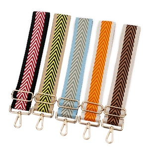 Bandoulière réglable en toile avec motif jacquard coloré et crochets en métal doré