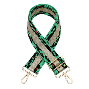 Adjustable leopard print bag strap in mint green with gold metallic line and gold clips