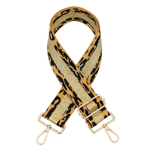 Detail of adjustable leopard print bag strap with gold thread and metal lobster clasps
