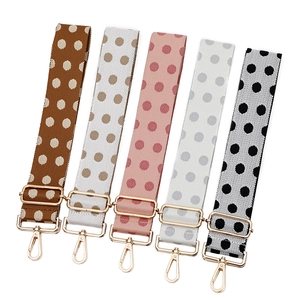 Adjustable polka dot shoulder straps in five colors with golden metal hardware buckles
