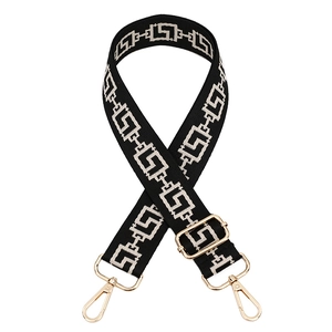 Adjustable wide black bag strap with white geometric pattern and gold metal hooks