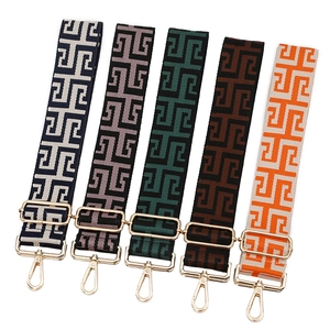 Adjustable woven shoulder straps for handbags with geometric maze patterns and gold hardware