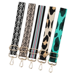 Adjustable woven shoulder straps with five colorful patterns and gold-toned metal buckles