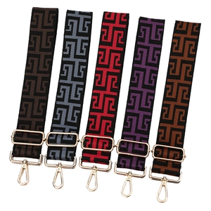 Adjustable wide replacement bag strap with geometric jacquard pattern and gold metal hardware