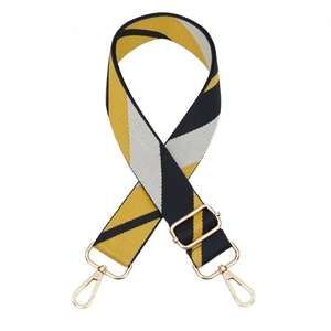 Adjustable wide replacement bag strap with geometric yellow white and black stripes