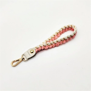 Pink and white braided rope handbag strap with gold lobster clasp and leather detail