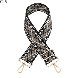 Detail view of adjustable geometric diamond pattern strap with gold lobster clasps